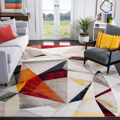 Light Grey and Orange Geometric Floral 9' x 12' Synthetic Area Rug