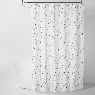 white cloth shower curtain