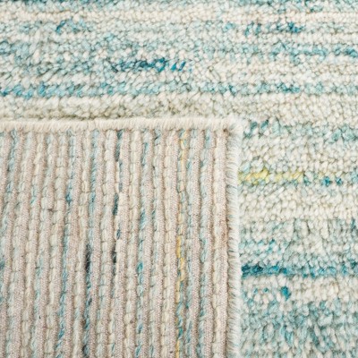 Ivory and Turquoise Handwoven Wool Shag Area Rug, 5' x 8'