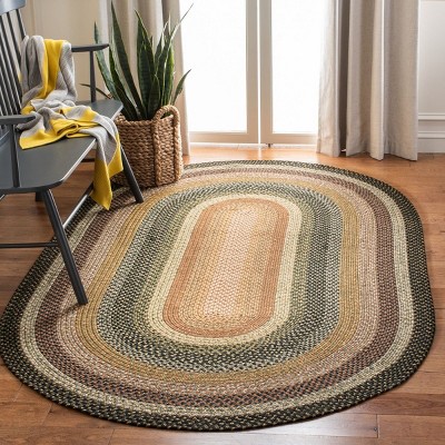 Handmade Blue Oval Braided Synthetic 6' x 9' Rug
