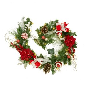 6-foot pre-lit Christmas wreath adorned with pine cones, berries, poinsettias, bows, and spherical ornaments, with 20 warm white lights. - 1 of 4