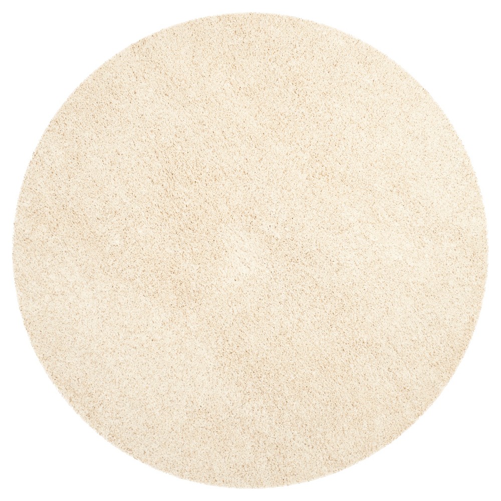 6'7in Round Rayan Solid Loomed Area Rug Beige - Safavieh