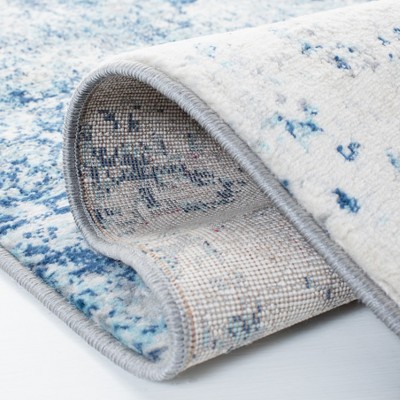 Ivory and Navy Square Synthetic Stain-Resistant Area Rug