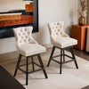 Leovsnove Velvet Swivel Bar Stool Set of 2,Counter Height Upholstered Rotating Barstools with Wood Legs,Footrest,Chrome Nailhead - 2 of 4