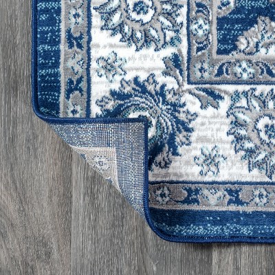 Ivory and Blue Floral Synthetic 4' x 6' Area Rug