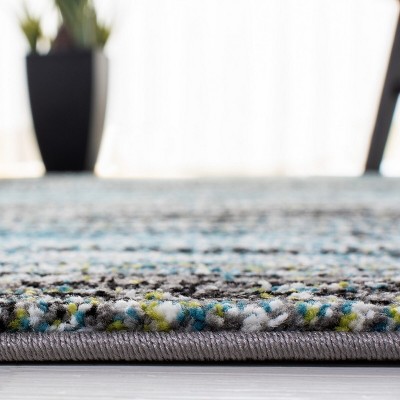 Blue and Charcoal Hand-Knotted Floral 4' x 6' Area Rug