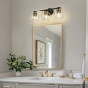 DORESshop 22 in. 3-Light Black and Gold Modern Bathroom Vanity Light with Clear Glass Shades, Wall Sconce for Large Spaces - 3 of 4