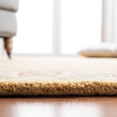 Antiquity Gold and Green Handmade Wool Area Rug