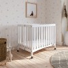 Child Craft Siesta Metal Compact Non-Folding Portable Crib with 2" Crib Mattress and Locking Wheels, Durable Metal Construction, Easy to Clean - 2 of 4