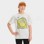Girls' Short Sleeve Oversized Butterfly Smiley World Graphic T-Shirt - art class™ White