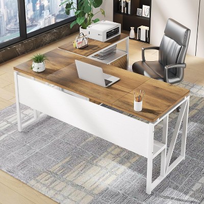 L-shaped desk with wood top and white frame in office with chair