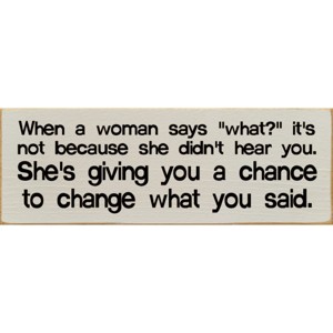 Slickblue When a Woman Says What Sign, 3.5x10 Funny Relationship Quote Plaque, Rustic Knotty Pine Wall or Shelf Decor - 1 of 3