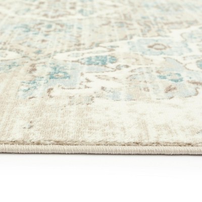Cream and Blue 4' x 6' Synthetic Oriental Area Rug