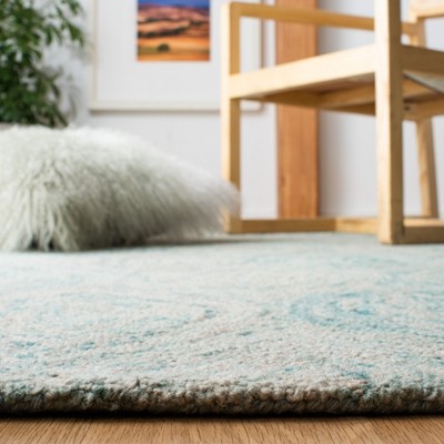 Ivory and Sea Blue Hand-Tufted Wool 6' x 9' Area Rug
