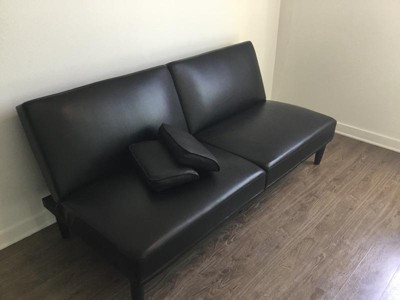 Black faux deals leather futon