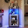 Coucheta an industrial-style corner bar cabinet with LED lights, five shelves, a glass rack, and a mesh door - 3 of 4