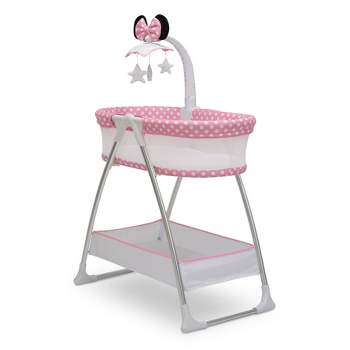 Delta Children Disney Minnie Mouse Bassinet with Rotating Mobile Arm, Vibration, Nightlight and Music - White/Pink