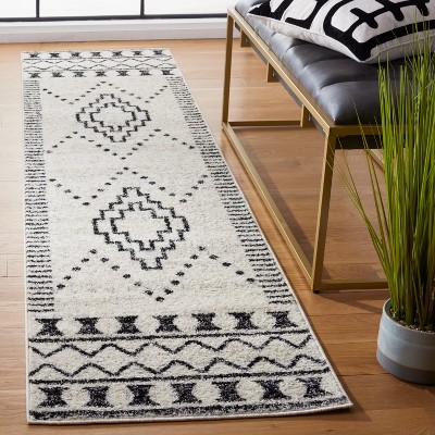 Boho-Chic Black and Ivory Geometric Runner Rug, 2'2" x 9', Hand-knotted Synthetic