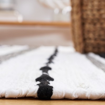 Boho Chic Black and Ivory Striped Kilim 5' x 8' Wool Area Rug