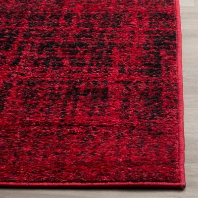 Red and Black Synthetic Rectangular Area Rug