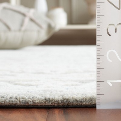 Ivory Rectangular Hand-Tufted Wool Area Rug 60" x 36"