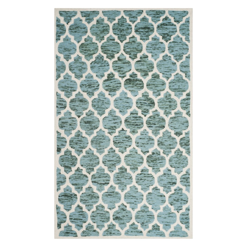 5'x8' Quatrefoil Design Loomed Area Rug Turquoise/Ivory - Safavieh