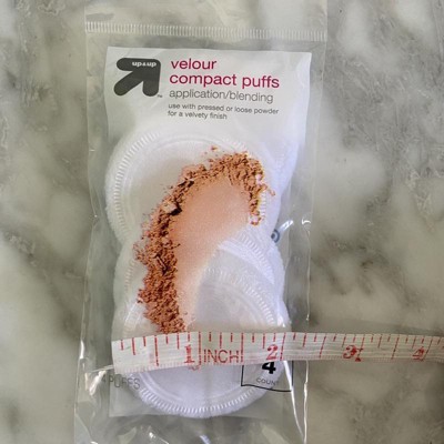 Target powder clearance puff