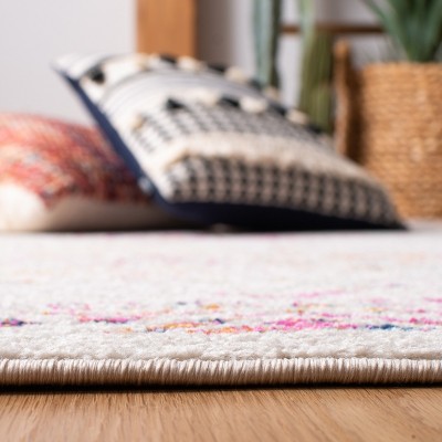 Ivory and Fuchsia Synthetic Boho Chic Accent Rug, 2' x 5'