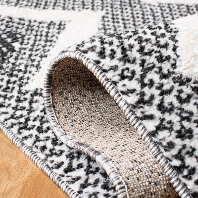 Ivory and Black Diamond Pattern Shag Area Rug with Braided Fringe