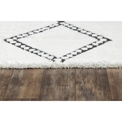 Ivory Rectangular Synthetic Area Rug with Southwestern Motifs