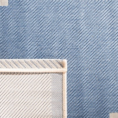 Easy-Care Blue & Beige Synthetic 5' x 7' Indoor/Outdoor Area Rug