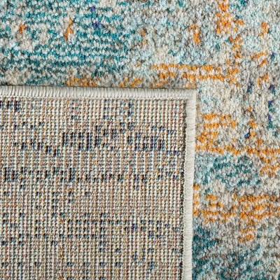 Rectangular Light Blue and Beige Synthetic Area Rug