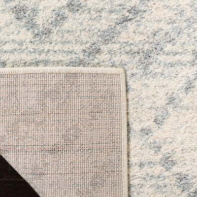 Ivory and Light Blue Geometric Rectangular Area Rug