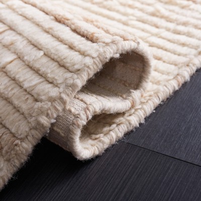 Beige and Ivory Handwoven Wool Shag Area Rug 3' x 5'