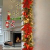 National Tree Company Pre-Lit Artificial Christmas Garland, Green, Evergreen, White Lights,Pine Cones, Ornaments, Poinsettia Flowers, Plug In,9 Feet - 2 of 4