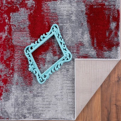 24" Abstract Red Synthetic Easy-Care Rectangular Rug