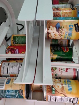 Organized my canned goods today. Our pantry is narrow, but deep. This made  it difficult to maintain FIFO and identify rear items. Soda can dispenser  racks from  solved the issue. 