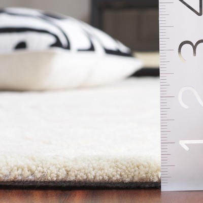 Ivory Hand-Tufted Wool 6' x 9' Contemporary Area Rug