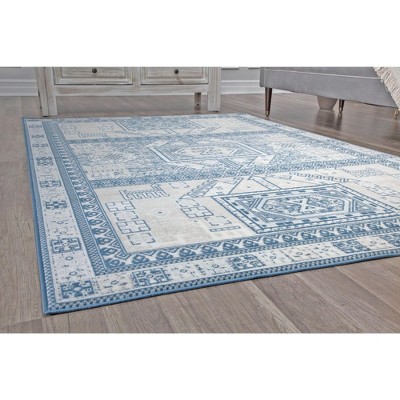 Azure Elegance 5' x 7' Reversible Blue Synthetic Area Rug
