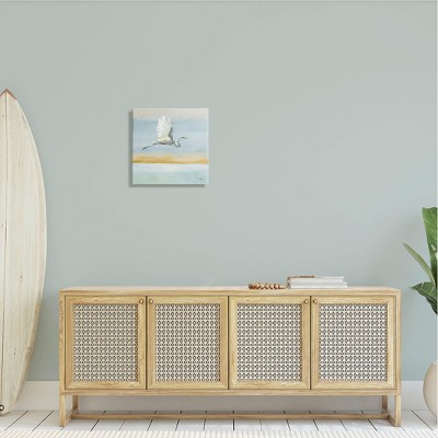 Egret Bird Flying Over Ocean Canvas Wall Art, 17 x 17