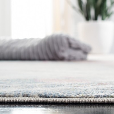 Ivory and Pink Abstract Synthetic Area Rug