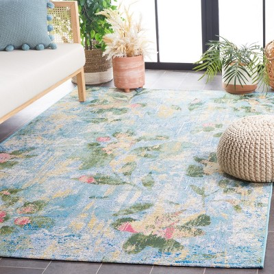 Reversible Light Blue Synthetic 4' x 6' Stain-Resistant Area Rug
