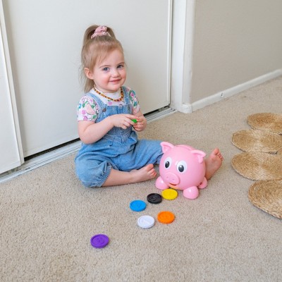 Interactive Pink Piggy Bank with Colorful Number Coins