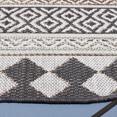 Havana Round Black and Light Brown Synthetic Indoor/Outdoor Rug