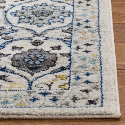 Ivory and Blue Reversible Synthetic Area Rug, 6'7" x 9'
