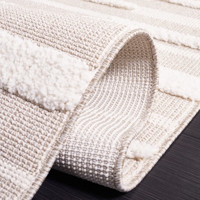 Ivory Geometric 9' x 12' Synthetic Easy Care Area Rug