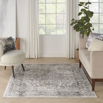 Ivory and Grey Synthetic 5' x 7' Reversible Area Rug