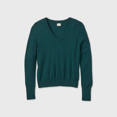 dark green sweater