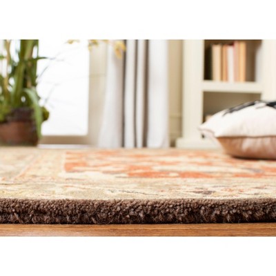 Hand-Tufted Rust and Green Wool Area Rug, 5' x 8'