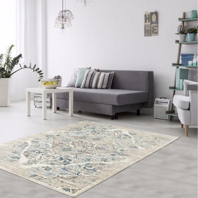 Cream and Blue 9' x 12' Synthetic Oriental Area Rug